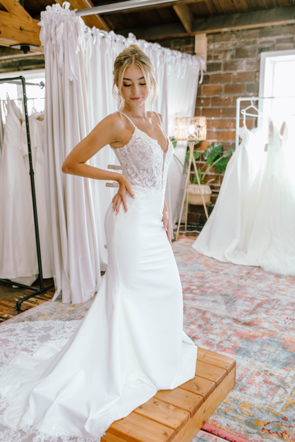 Model wearing a white bridal dress