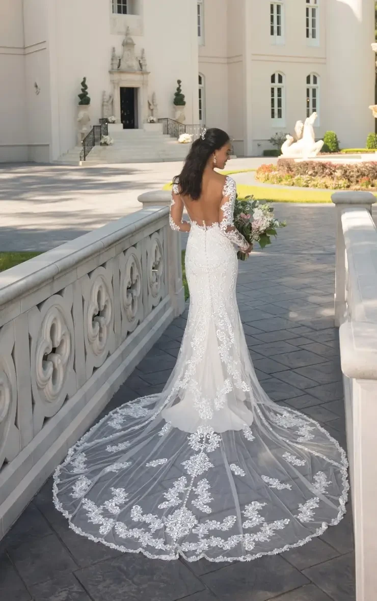 For the Bride Who Loves Drama: Our Favorite Gowns with Bold Back Details Image