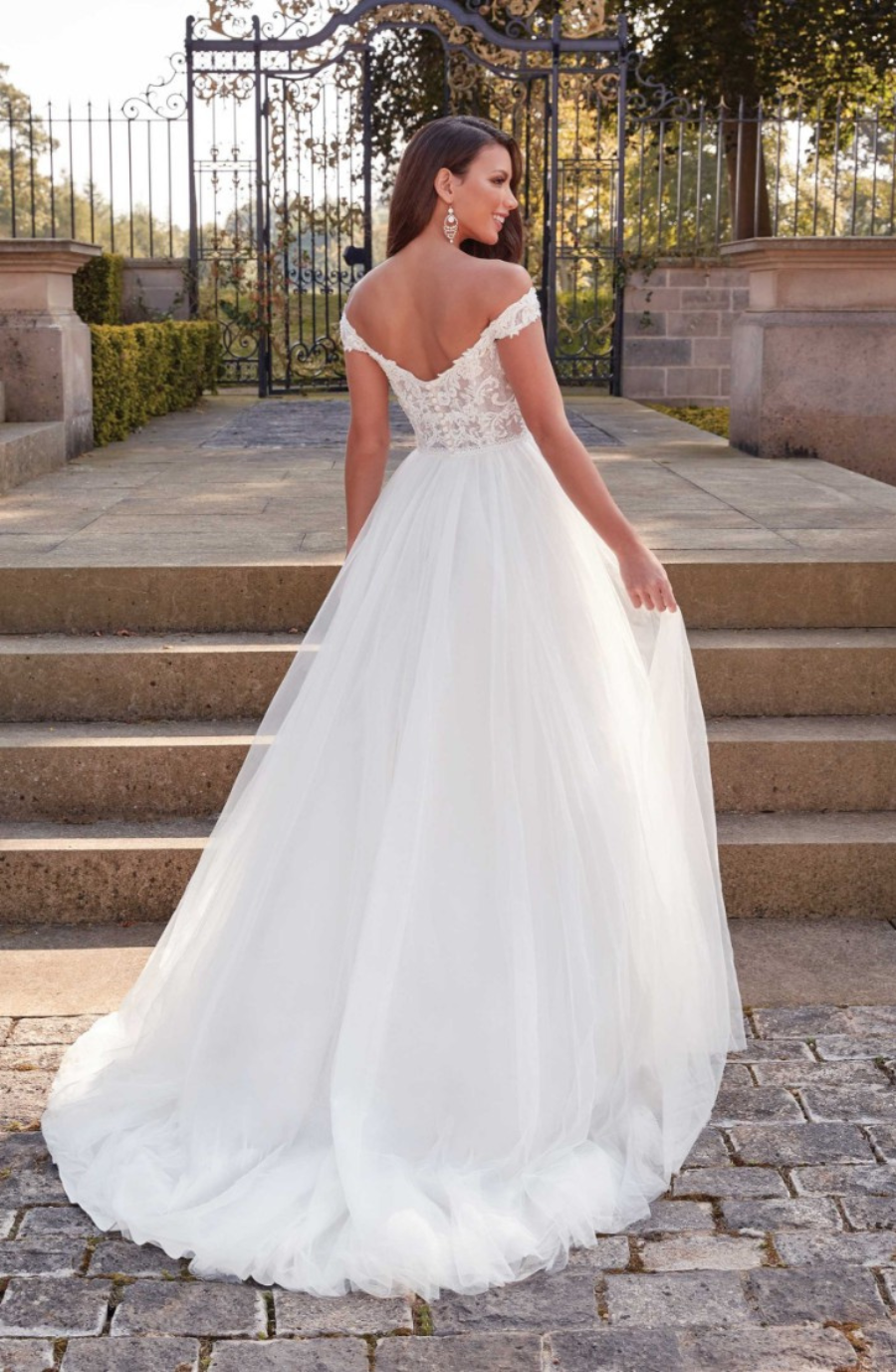 model is wearing an a-line bridal gown